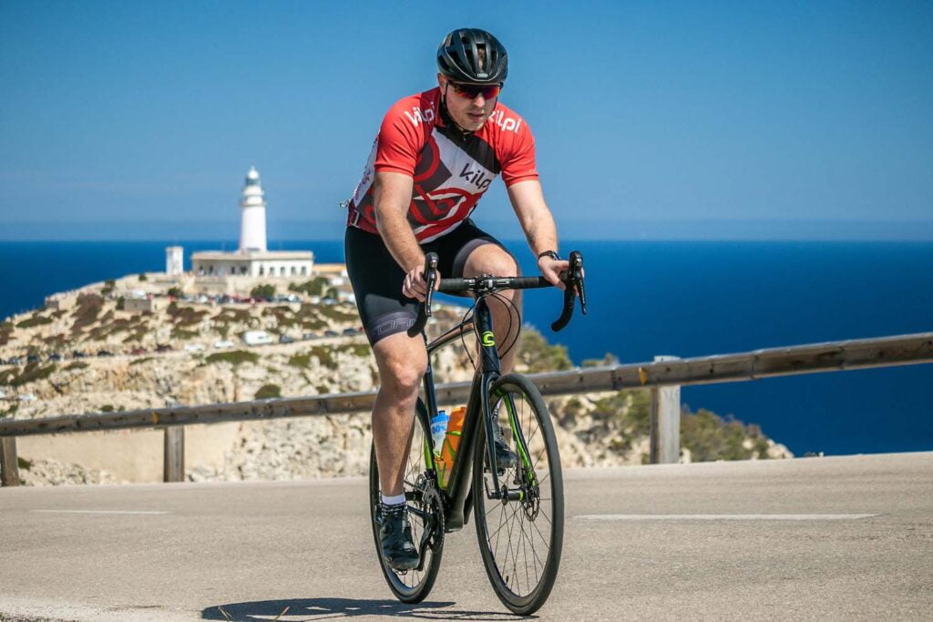 foto cyklisty u majáku Formentor